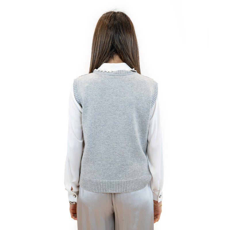 gilet clips con paillettes.