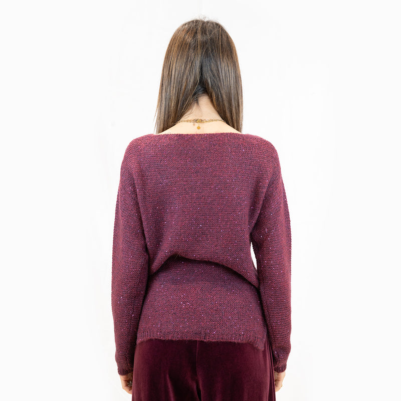 maglia clips con paillettes